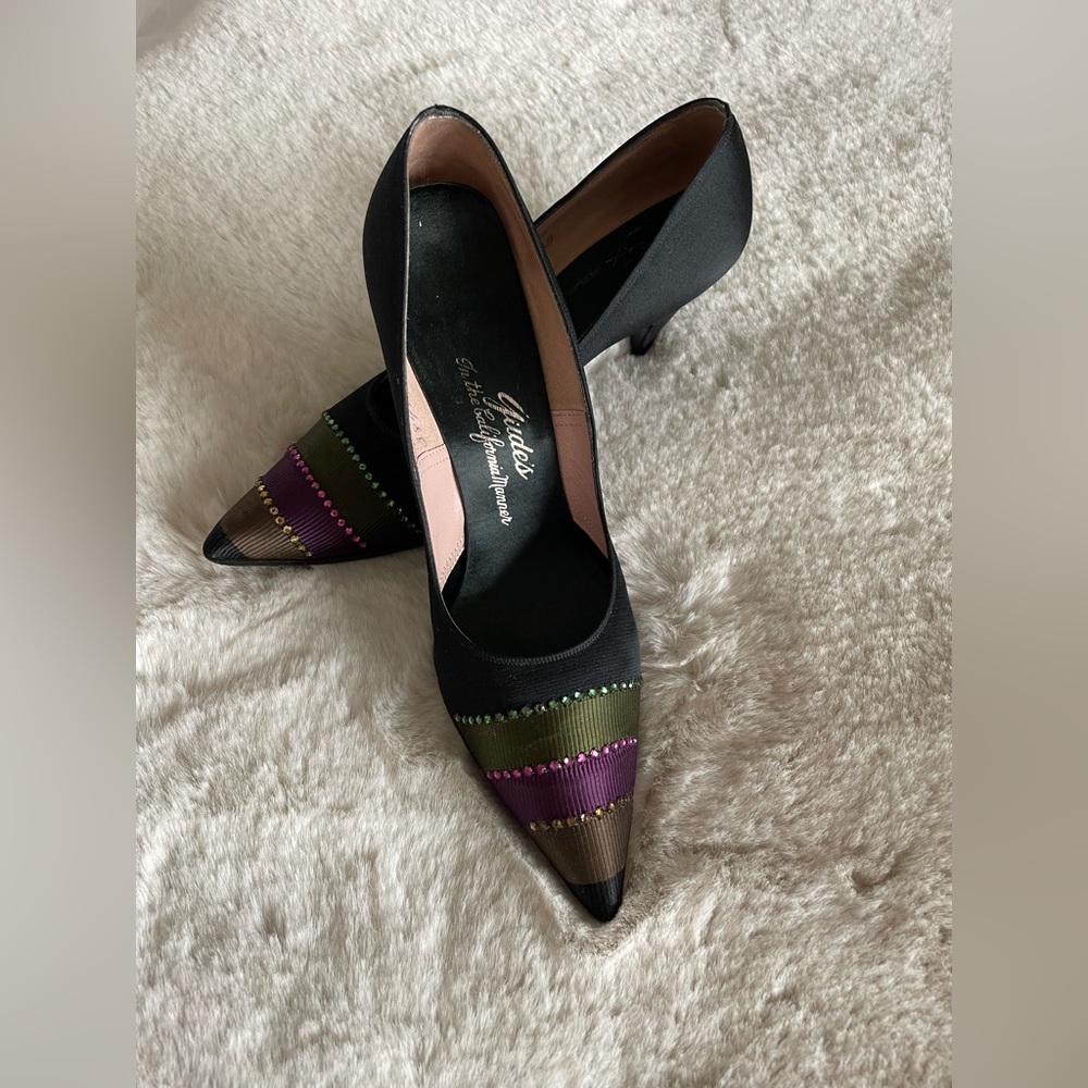 Vintage woman’s satin and rhinestone pumps.